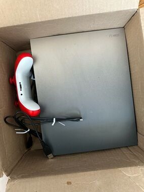 Xbox One X Console with Red/White Controller